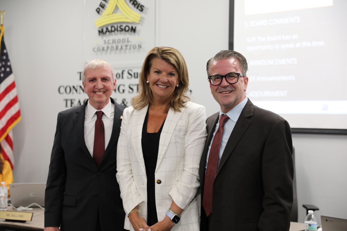 Outgoing Superintendent Dr. Jerry Thacker, new Superintendent Dr. Heather Short, & Board President Chris Riley