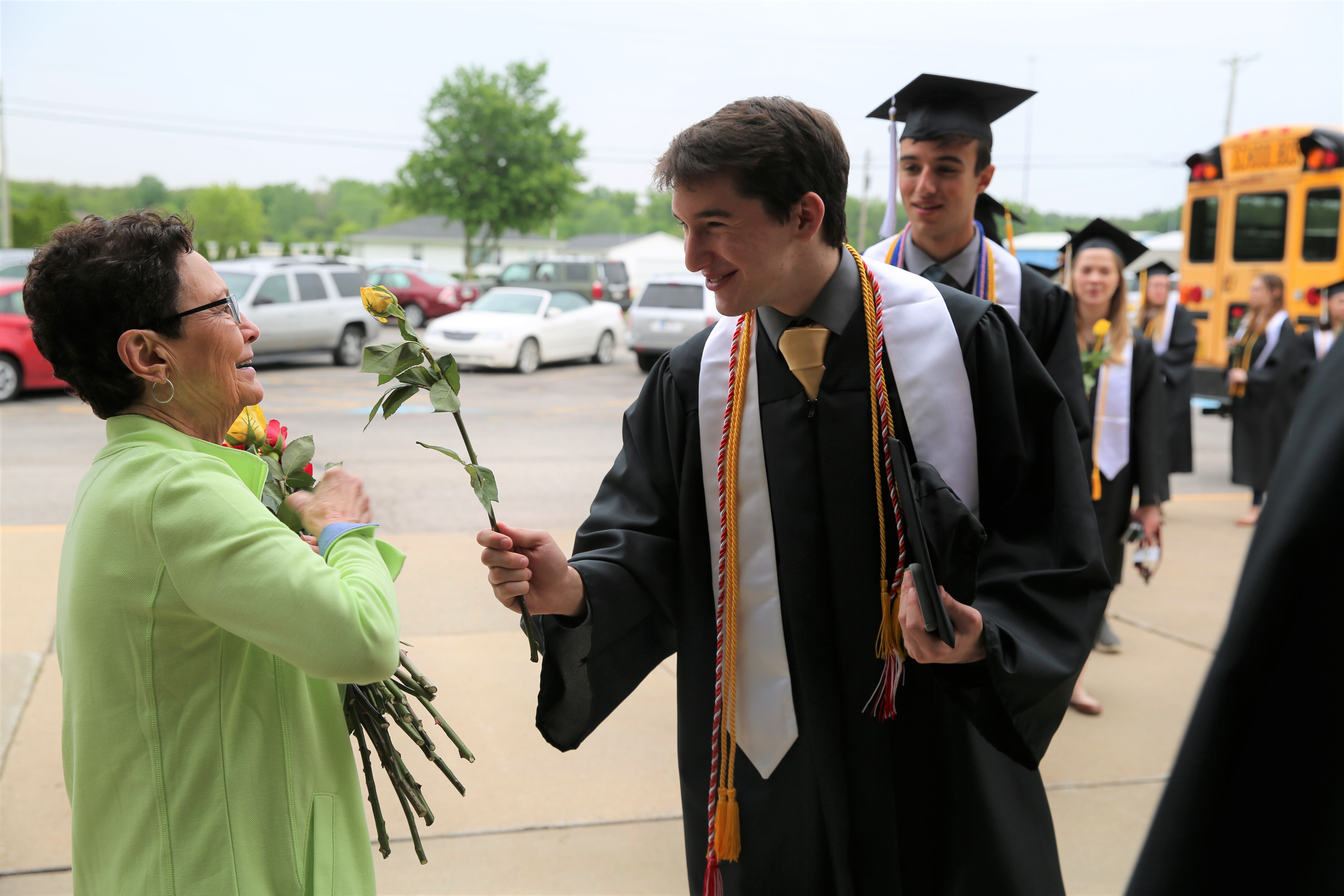 Graduating Penn students surprise retiring Discovery principal, Mrs. Sheryll Harper